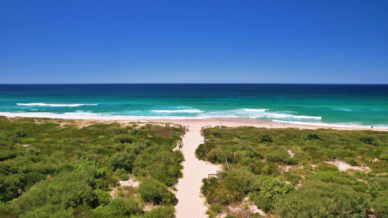 Pullman Magenta Shores Resort Entrance Buitenkant foto View of the beach from the lighthouse