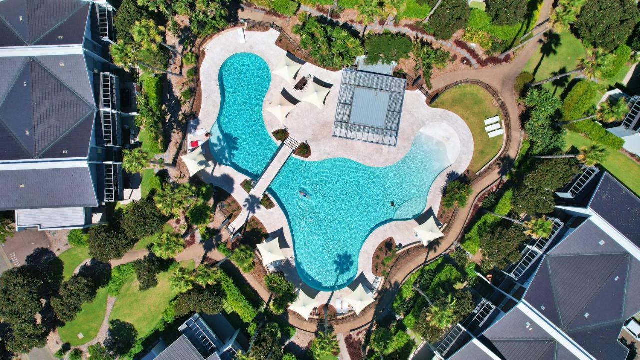 Pullman Magenta Shores Resort Entrance Buitenkant foto Aerial view of the pool at the 2018 Commonwealth Games
